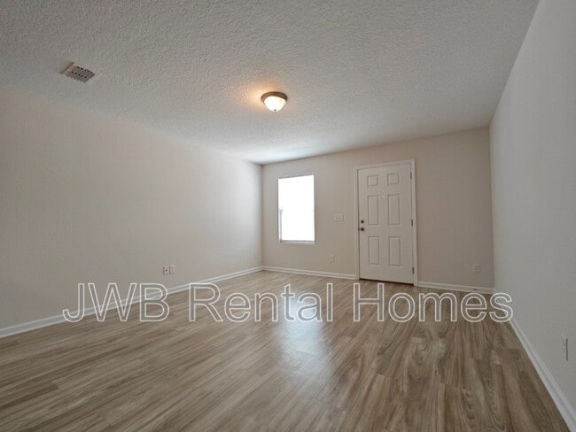 Building Photo - 8498 McGirts Village Ln