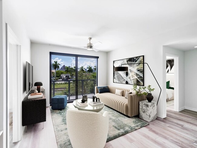 Stylish living spaces at Modera Aventura blend sleek design with views of Miami’s tropical landscape. - Modera Aventura