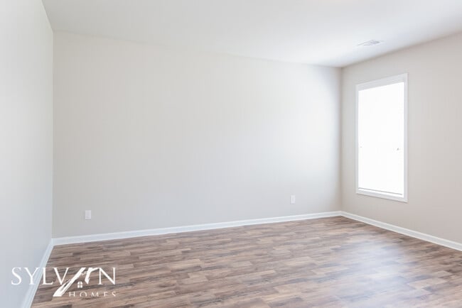 Building Photo - Embrace the charm of this 4 BR, 2.5 BA home