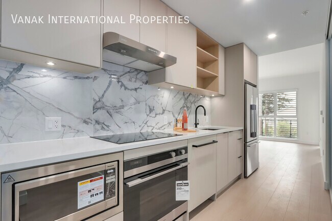 Photo du bâtiment - 422-422 E 3rd St
