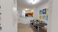 Step into a world of endless possibilities in this beautifully crafted 670 sq ft apartment. The open-concept living area seamlessly blends modern aesthetics with practical comfort, creating an inviting space perfect for both relaxation and entertainment. The living room boasts contemporary artwork and plush seating, with pops of vibrant yellow accents that infuse energy and warmth into the space.

The kitchen is a chef's dream, featuring sleek wooden cabinetry, granite countertops, and state-of-the-art black appliances. The breakfast bar adds a touch of sophistication while providing additional seating for casual dining or conversation.

The tranquil bedroom offers a serene retreat, adorned with soothing artwork and bathed in natural light. With ample space for a queen-sized bed and additional furnishings, it's the perfect sanctuary after a long day.

The bathroom showcases a modern design with a spacious vanity, large mirror, and a shower/tub combination, perfect for unwinding. Throughout the apartment, you'll find thoughtful touches like a dedicated workspace, ample storage, and stylish lighting fixtures that elevate the overall ambiance.

This apartment isn't just a living space; it's a canvas for your dreams and aspirations. Whether you're a young professional, a student, or someone looking to downsize without compromising on style, this home offers the perfect foundation for your next chapter. Experience the joy of maintenance-free living while being part of a vibrant community in the heart of Gainesville.