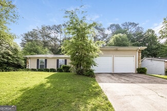 Building Photo - 8560 Glenwoods Dr