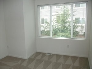 Building Photo - Stylish 2br/2.5ba Townhome with 2-car tand...