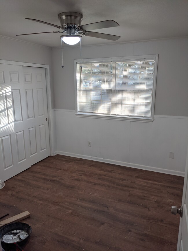 One of the three bedrooms, all have ceiling fans - 9510 Gov Beauvais Dr