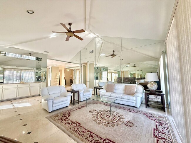 Building Photo - AVAILABLE NOW!! GORGEOUS 3 Bedroom 3 Bathroom Condo with Lake Views in Rancho Mirage!