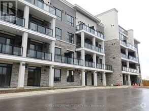 Building Photo - 120-120 Springvalley Crescent