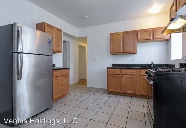 Foto del edificio - 2721-2727 E 75th Pl