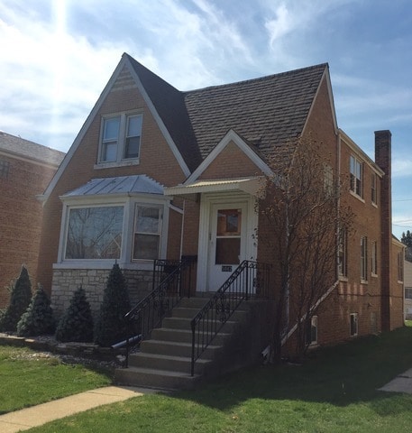 Building Photo - 5042 N Mango Ave
