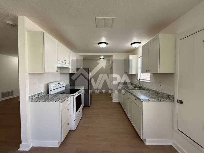 Foto del edificio - 9315 Cliff Way St