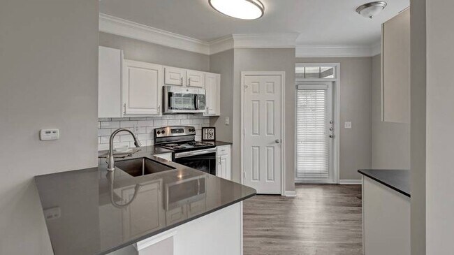 Foto del edificio - Hamptons at Woodland Pointe