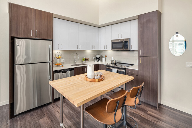 Kitchen with Stainless Steel Appliances - Arbory Apartments