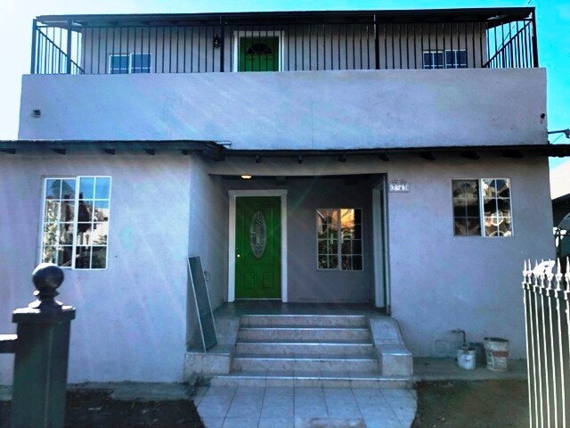 Fachada de la propiedad - 1035 W 39th Pl