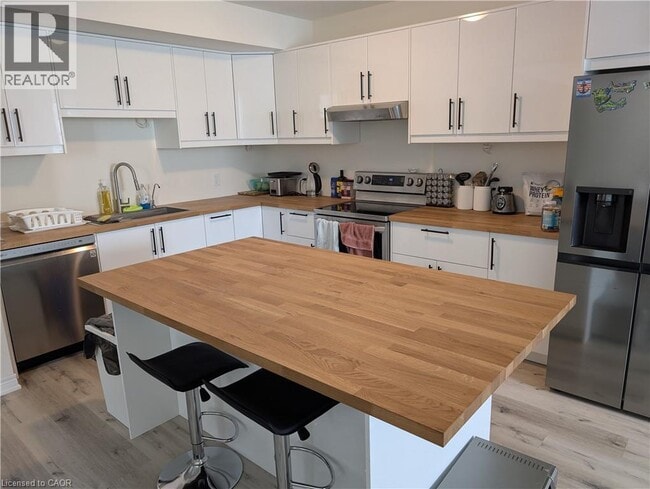 Photo du bâtiment - 4202 Manson Ln