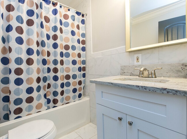 Private Bathroom With Bath Tub - The Residence at 1743 N Decatur Apartments