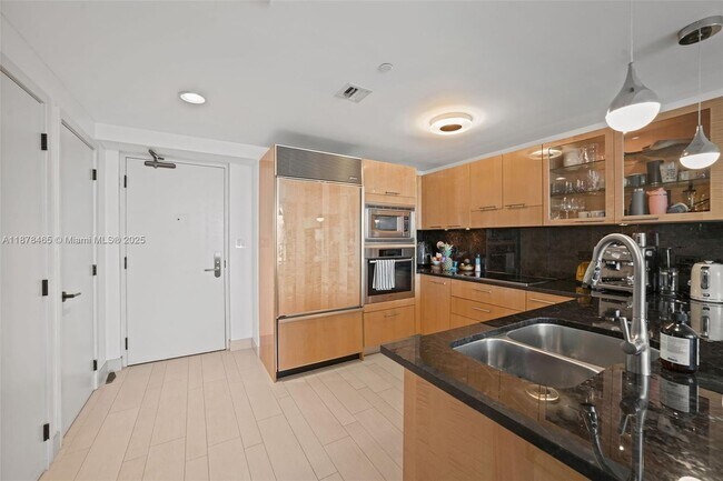 Building Photo - 6799 Collins Ave