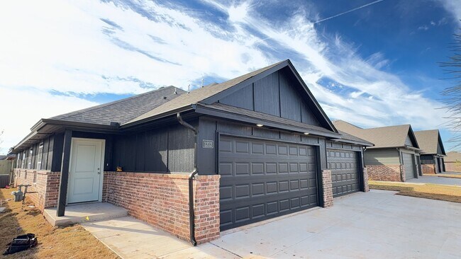 Building Photo - Welcome to Brand New Masonwood featuring this 3 Bedroom 2 Bath 2 Car Garage Duplex in a Great loc...