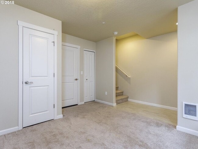 Building Photo - Neat and Tidy Newer Town Home with Two Master Bedrooms and Den on the Main Level - $500 off your ...