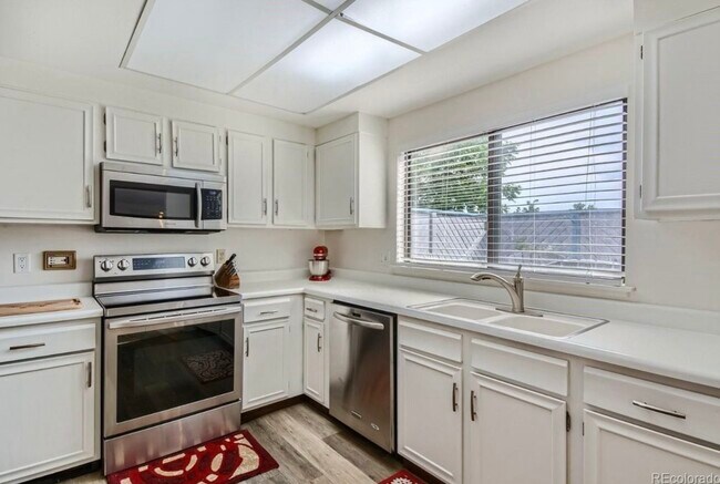 Kitchen with gas stove, garbage disposal and dish washer - 2477 S Victor St