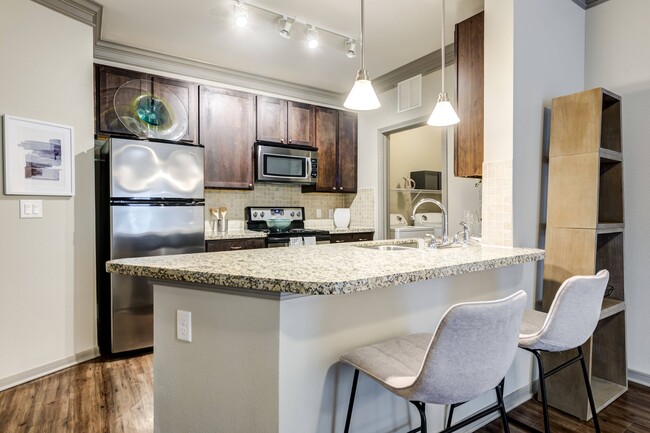 Cocina comedor - Avenues at Craig Ranch Apartments