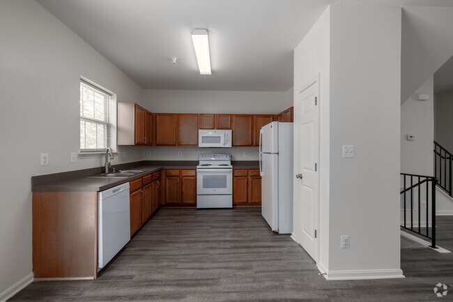 3BR, 3.5BA - 1,960SF - Kitchen - The Pointe at Manorgreen Townhomes