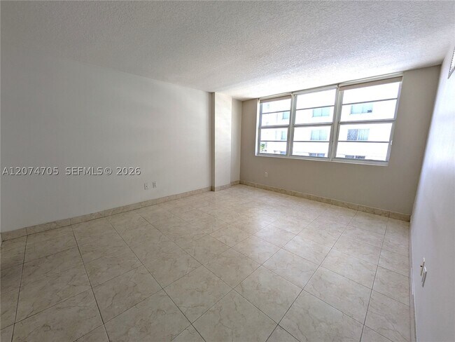Building Photo - 6917 Collins Ave