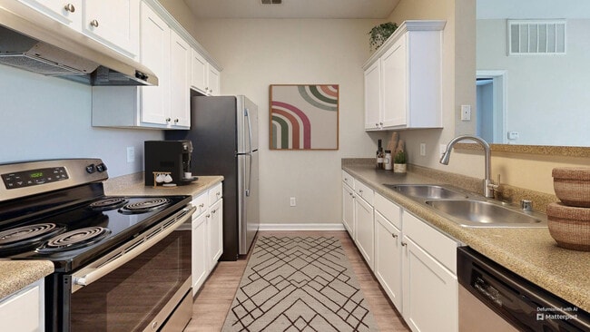 Kitchen with Stainless Steel Appliances - Columns on Wetherington Apartments