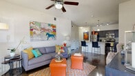 Located at 7035 Pickwell Dr in San Antonio, TX, this single-story 2-bedroom, 2-bathroom home offers a thoughtfully designed layout with a cohesive modern aesthetic throughout. Polished concrete floors extend across the main living areas and bathrooms, lending a sleek, contemporary character to the space.

The open kitchen is a standout feature, showcasing dark cabinetry, granite countertops, stainless steel appliances, and a peninsula with bar seating — ideal for casual dining or entertaining. Pendant lighting and track lighting illuminate the space effectively. The kitchen flows naturally into the living room, which is bright and inviting, featuring a ceiling fan, large windows that draw in natural light, and access to a covered outdoor porch overlooking a tree-lined street.

Both bedrooms are comfortably sized, with the primary bedroom offering a ceiling fan and a double-door closet. The two bathrooms mirror the home's modern style, each featuring dark vanity cabinetry, granite countertops, and polished concrete floors. The primary bathroom includes a wide vanity with a large mirror and overhead lighting, while the second bathroom features a tub-shower combination. A hallway connects the rooms efficiently, completing this well-organized and stylish home.