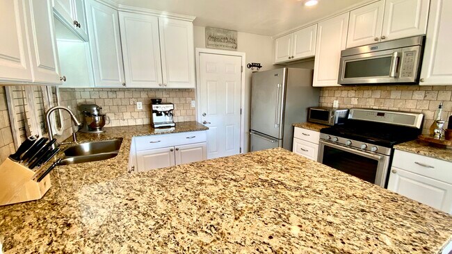 Foto del edificio - 5639 Blossom Park Ln