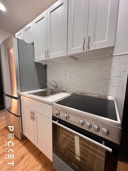 Building Photo - 520 E 14th Street Unit 17