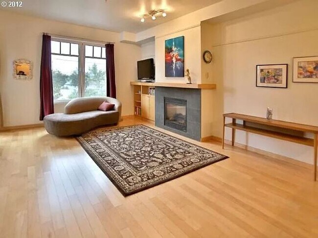 Building Photo - Spacious Beaumont Village Condo with Cover...