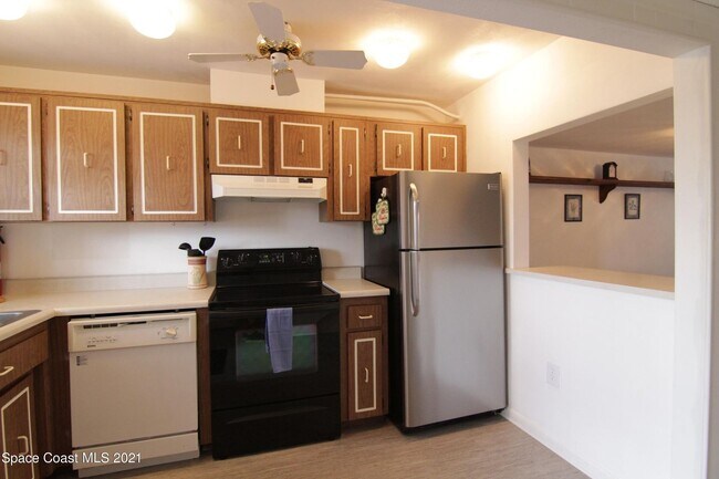 Kitchen, now new fixtures - 2521 Country Club Dr