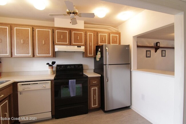 Kitchen, now new fixtures - 2521 Country Club Dr