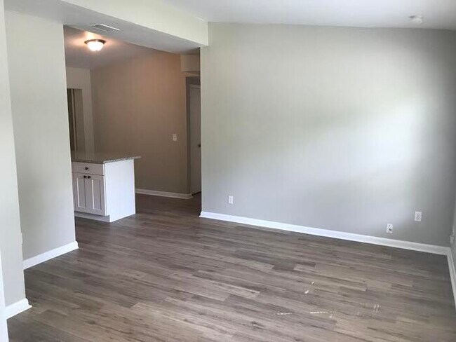 Building Photo - Spacious 4 Bedroom Home With Garage And Modern Updates