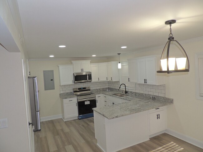 Building Photo - 2025 Womble Dr
