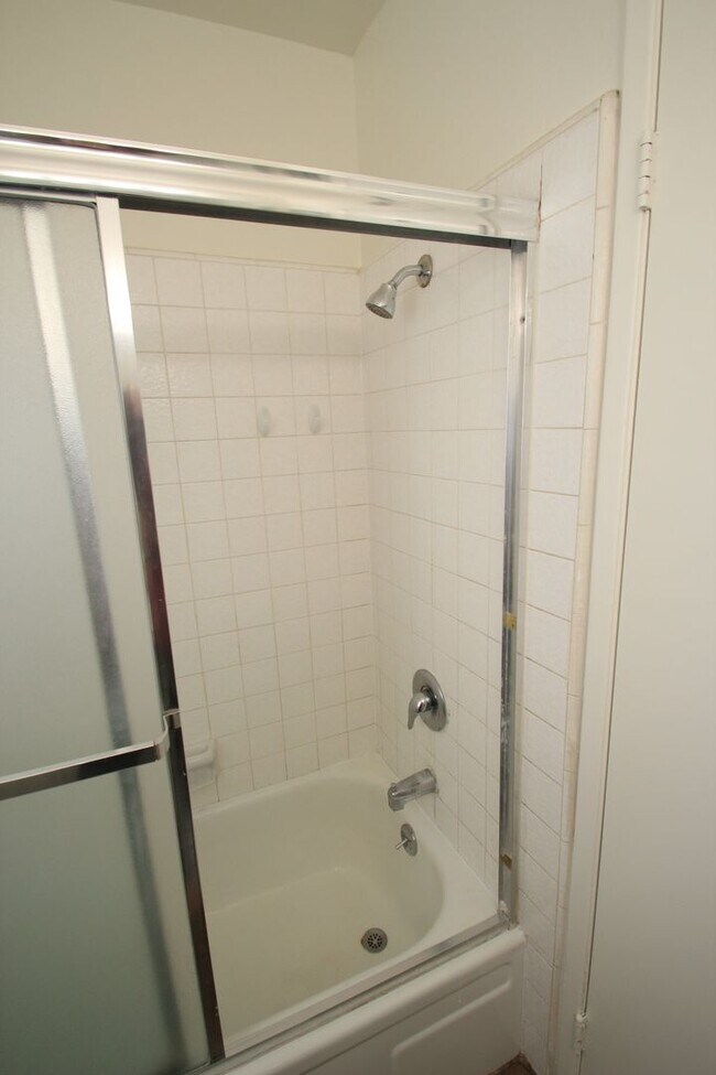 Building Photo - Welcome to this beautifully updated two-story condo