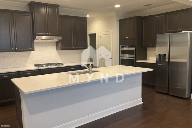 Foto del edificio - 4 br, 3.5 bath Townhome - 3150 McMurtry St