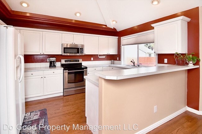 Building Photo - 4 br, 3 bath House - 10522 W Carolina Dr