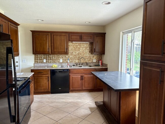 Building Photo - Harvey Park Location!  Single Family Home ...