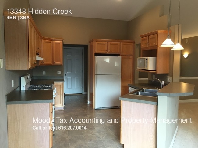 Foto del edificio - 13348 Hidden Creek Dr