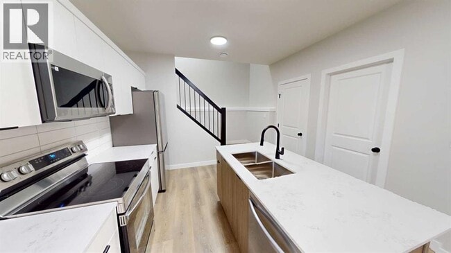 Photo du bâtiment - 10201-10126 126 Ave