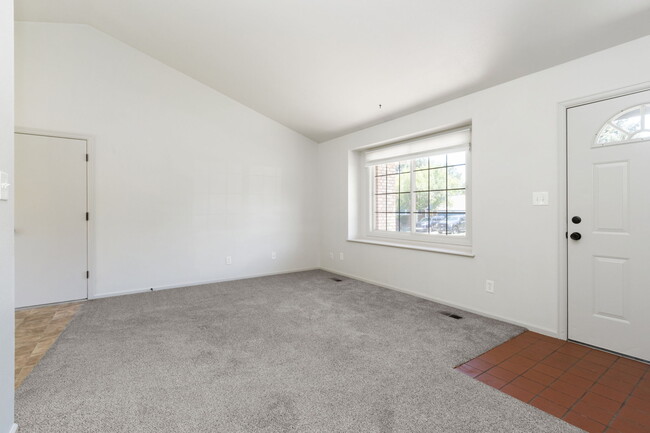 Vaulted living room with south facing window. - 1956 Promenade Way