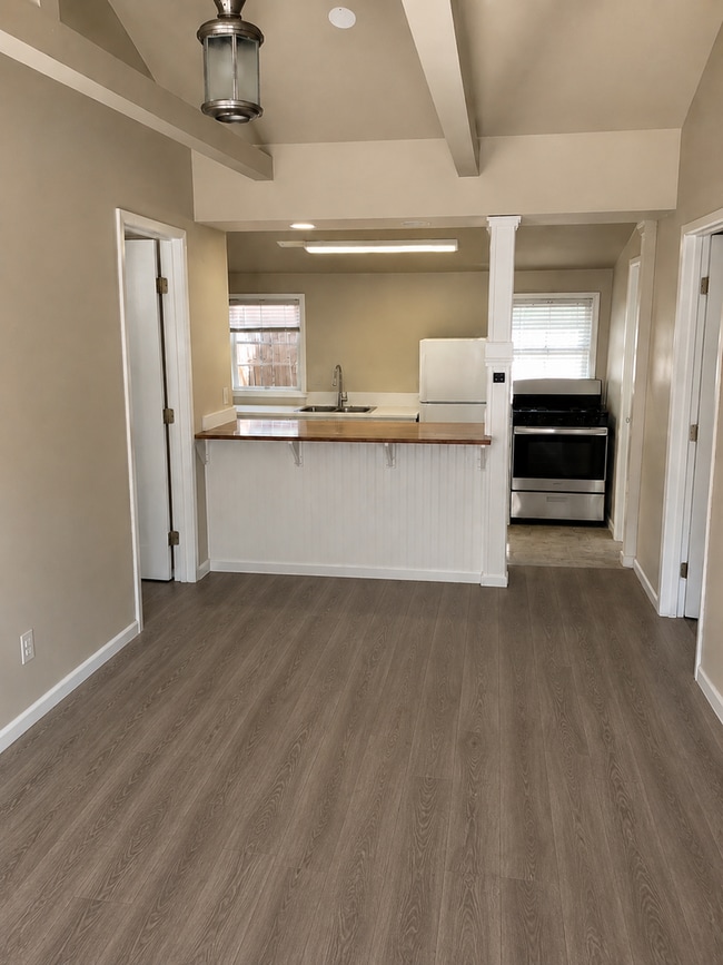 Building Photo - Available 6/25. Private rear unit, 5-minute walk to Cal Poly, parking included but no car needed.