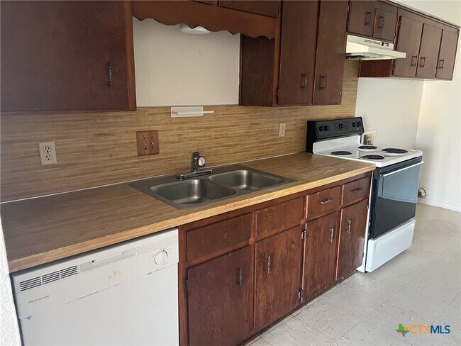 Foto del edificio - 902 Travis Ln