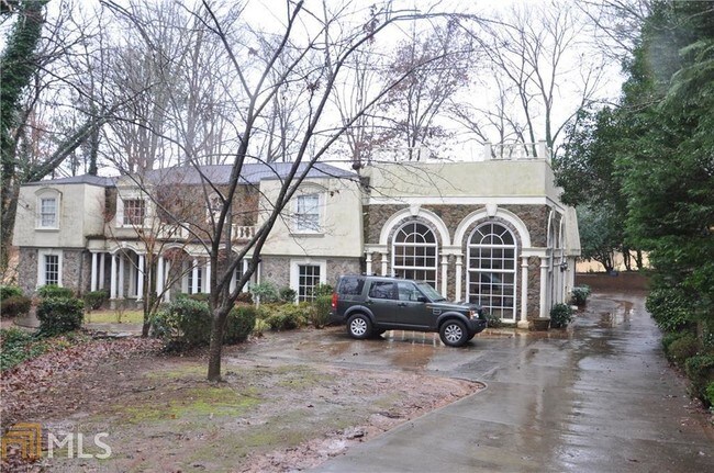 Building Photo - 8970 Huntcliff Trce