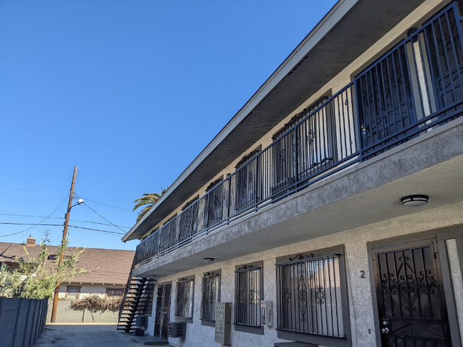 Building Photo - 7606 S Figueroa St