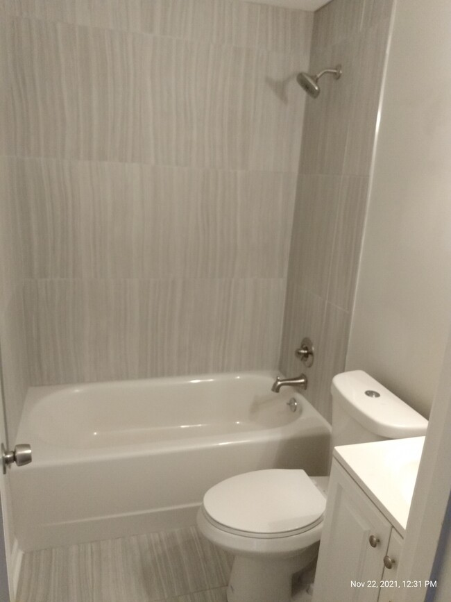 New tub and shower fixtures - 132 Taylor St