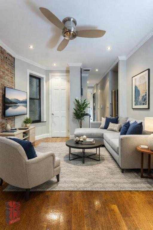 Photo - 309 E 8th St Apartment