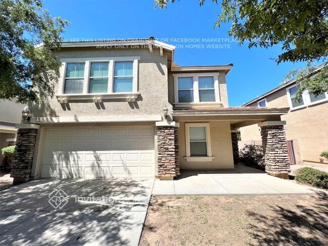 Building Photo - 1418 S 122nd Ln