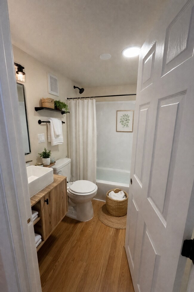 Virtually staged bathroom - 3201 Grand Ave