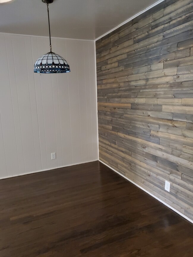 Dining with wood feature wall - 337 hurst dr